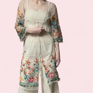 Floral embroidered sheer top with ruffle sleeves